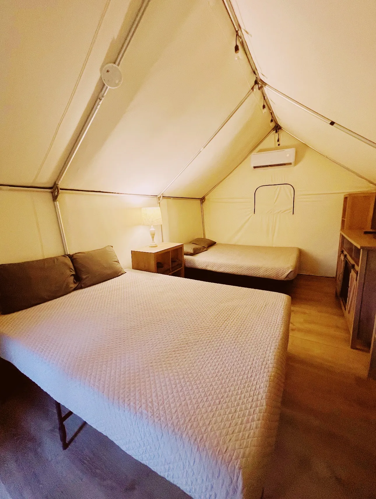 Glamping cabin interior near San Antonio with real beds and AC