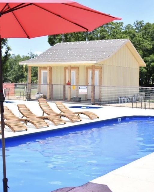 Group tubing near riverside picnic table