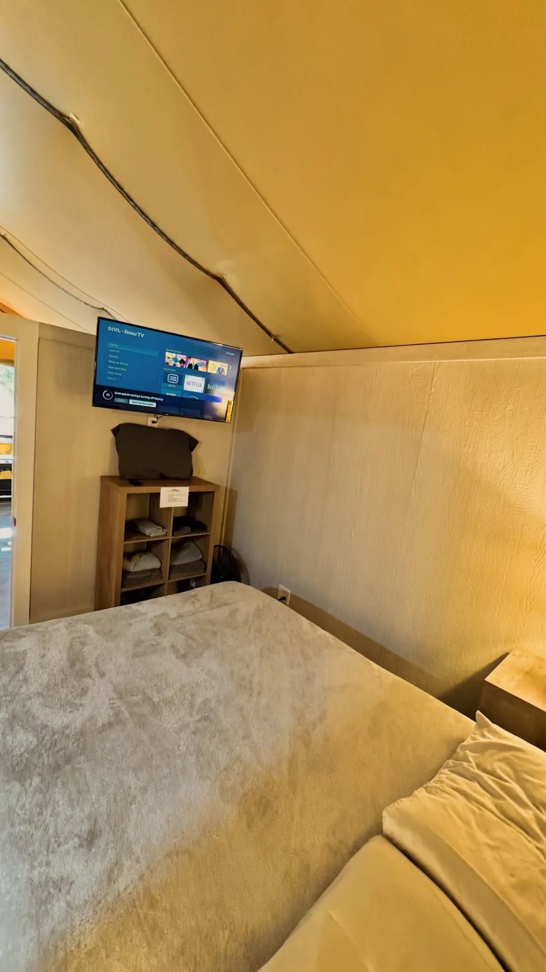 Safari Cabin bedroom with TV