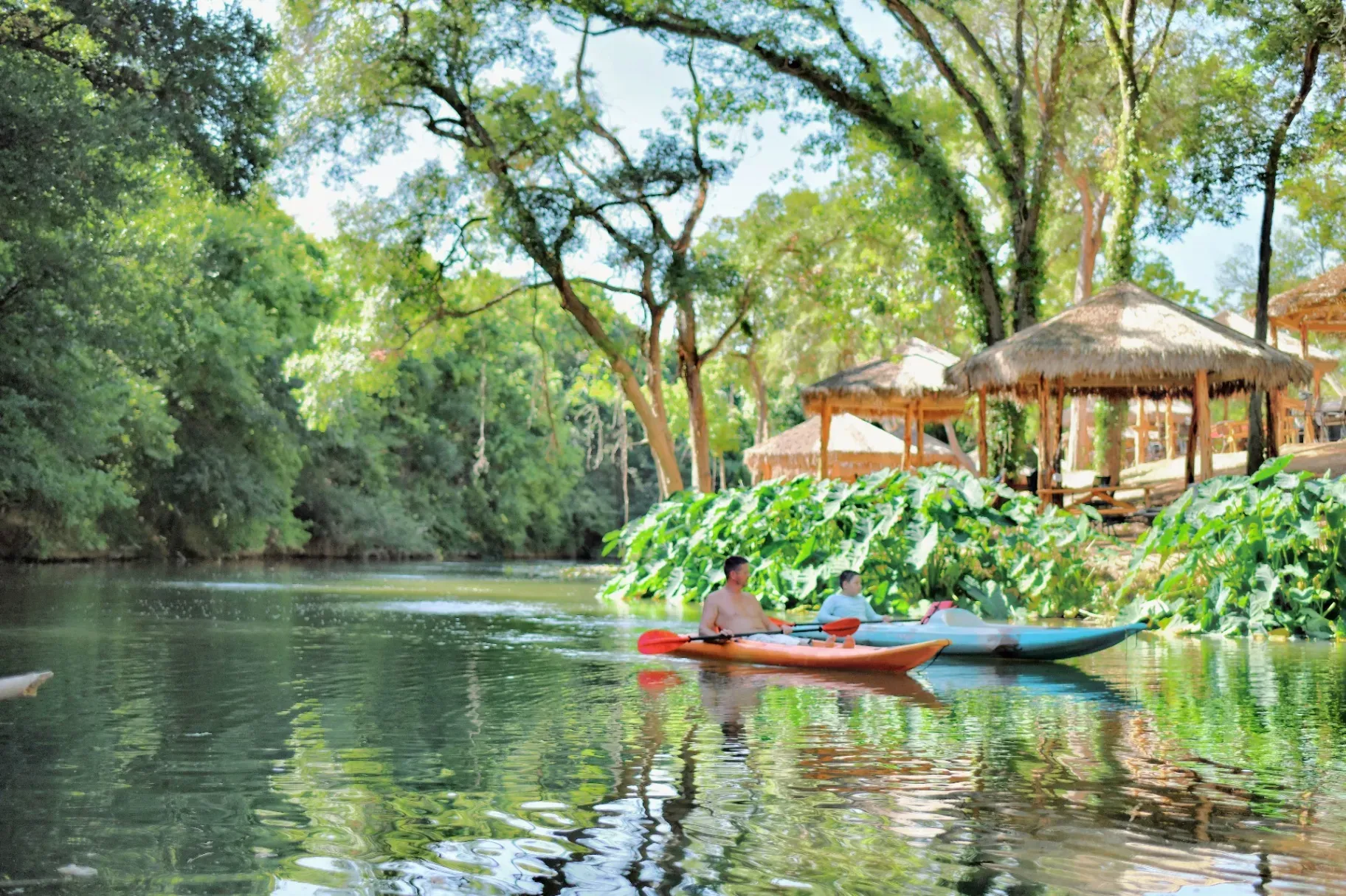 Friends enjoying tubing on the San Marcos River at Son's River Ranch