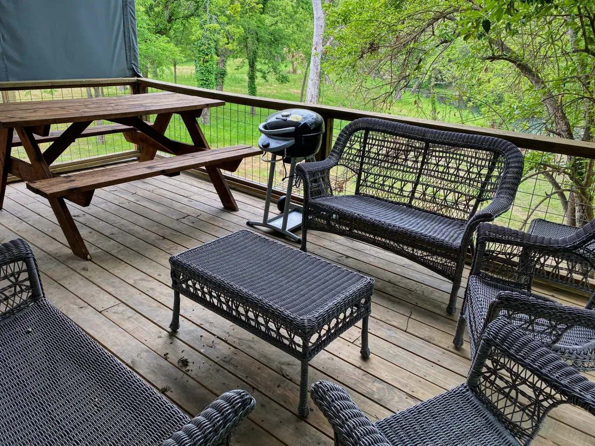 Waterfront Cabin private deck with furniture